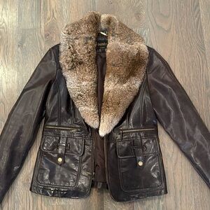 Leather jacket with fur trim
